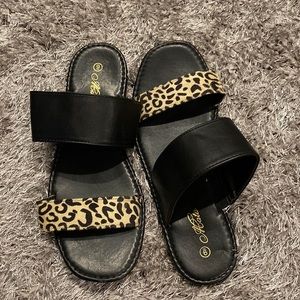 Size 9 women’s sandals. Black and leopard print. Never worn. Brand new